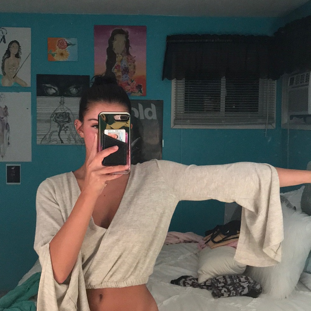 Cropped sweater with open back